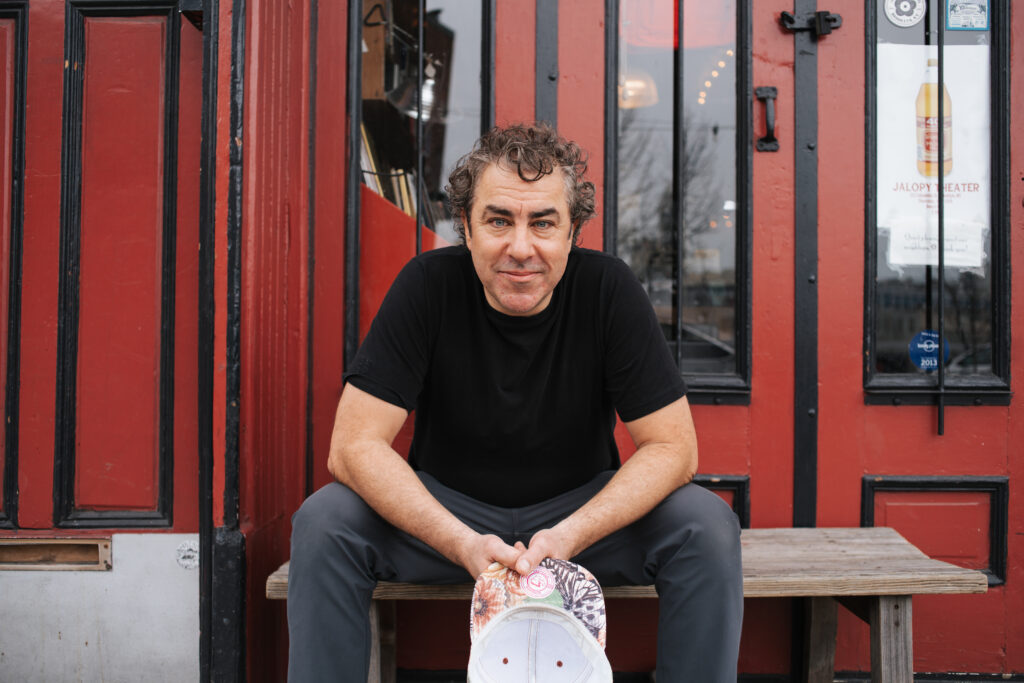 Michael Napolitano, early childhood music educator and author, smiling and leading a joyful music class.